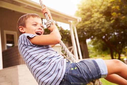Smiling child enrolled in the vitamin program